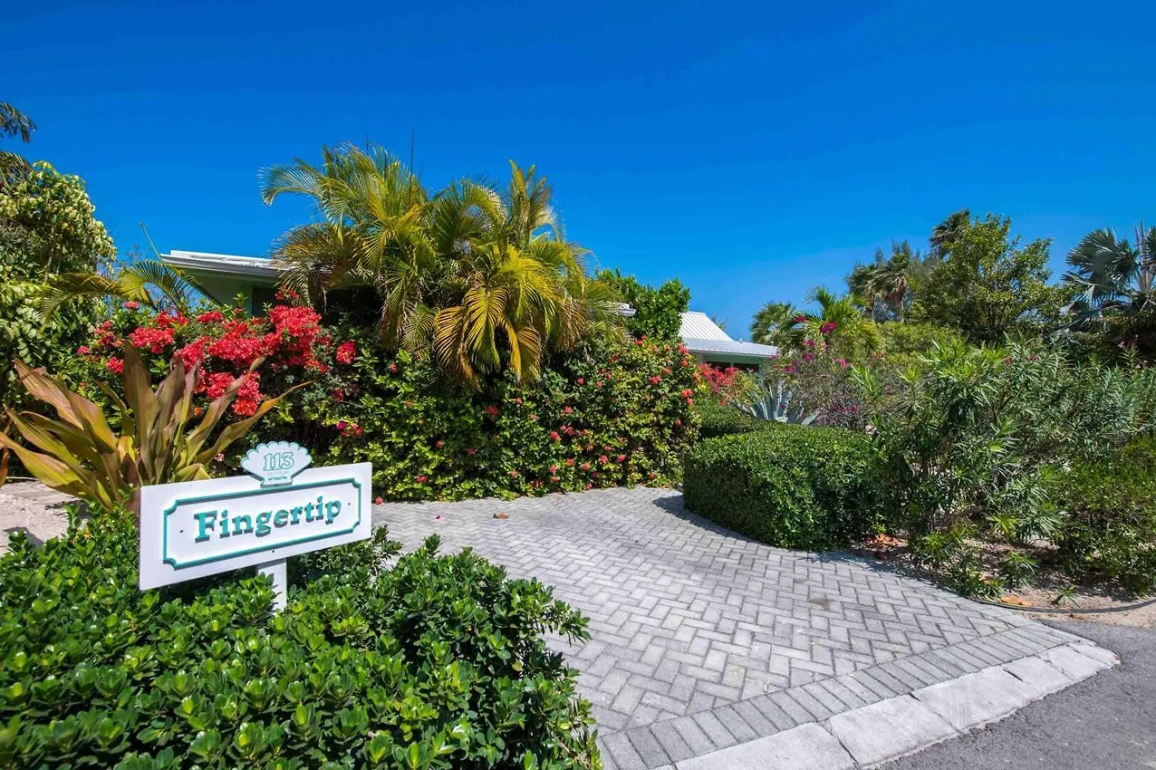 Vakantiehuis Fingertip - Beach Bungalow In Cayman Kai Driftwood Village Kaaiman-eilanden